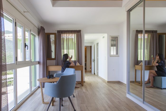 villa-cohili-sivota-lefkada-greece-bedroom-spacious-area-with-modern-furniture-private-balcony
